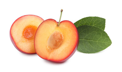Cut ripe cherry plum with leaves on white background
