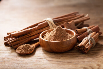 Cinnamon sticks and bowl of cinnamon powder