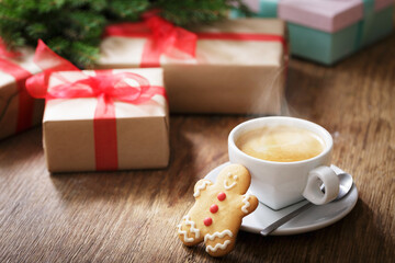 cup of coffee with christmas cookies