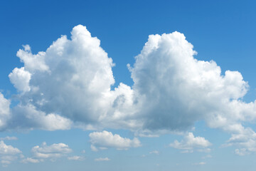 Naklejka na ściany i meble Beautiful, thick clouds in the blue sky. Nature.