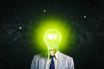 Businessman with a glowing light bulb instead of a head. Starry sky. Concept of new ideas....