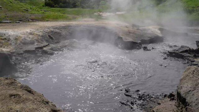Hot natural thermal water springs in Kamchatka Peninsula in Russia.