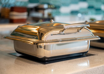 buffet food warmer containers on the table