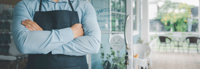 Waitress armcross at open door retail store shop, Business reopening during covid19 concept