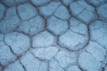 Abstract texture lines in the desert, close-up of arid land. Yellow background picture. The desert features of Africa.