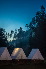 tent in the night woods