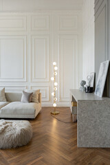 minimalistic interior of an ultra modern open plan apartment with white and gray walls with a...
