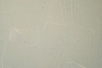 Background with poured concrete. Texture of grey wet cement leveling on surface.