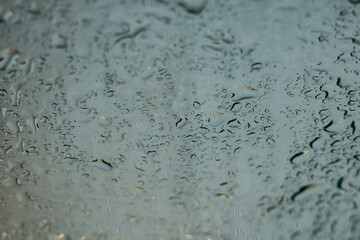 water drops on glass, dark key. Nobody