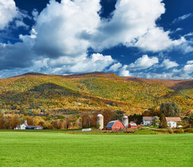 Farm with red barn and silos in Vermont