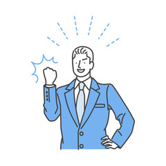 ガッツポーズするスーツの男性