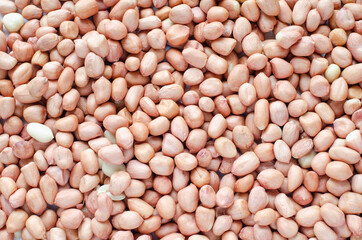 Dry organic peanut seed pile background, ready for healthy food or dessert ingredient. For carbohydrate food type or agricultural product concept