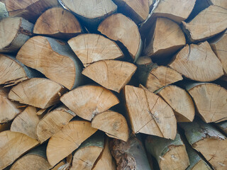 firewood abstract photo background. neatly folded pile of firewood