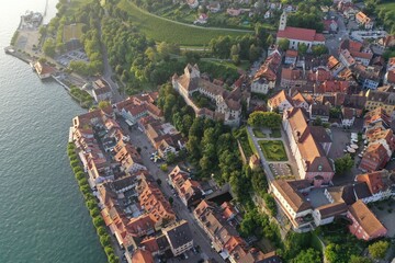 Naklejka premium Aerial drone shot of Meersburg at Lake Constance, Bade-Württemberg, Germany while sunset
