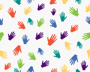 Vector seamless pattern wirh rainbow color handprints. International childrens day. Concept of friendship, happy childhood, unity of peoples.