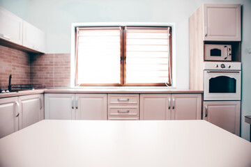 Cozy bright kitchen interior with wooden furniture