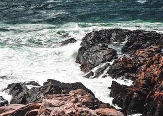 Landscape photo of sea, waves and cliff