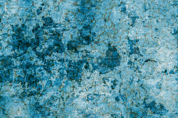 Blue wall texture with a complex structure in cracks and scratches