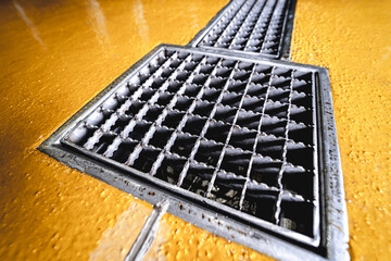 stainless steel floor drain at a modern beer factory - obrazy, fototapety, plakaty
