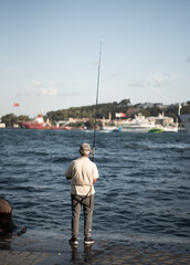 Obraz premium Man fishing in Istanbul, Turkey