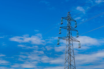 High voltage electricity tower (blue sky background)