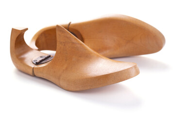 Wooden lasts shoes isolated at white background. Wood last for cobbler