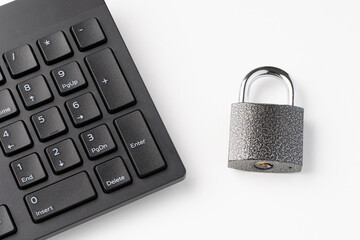 keyboard and lock close-up on white background