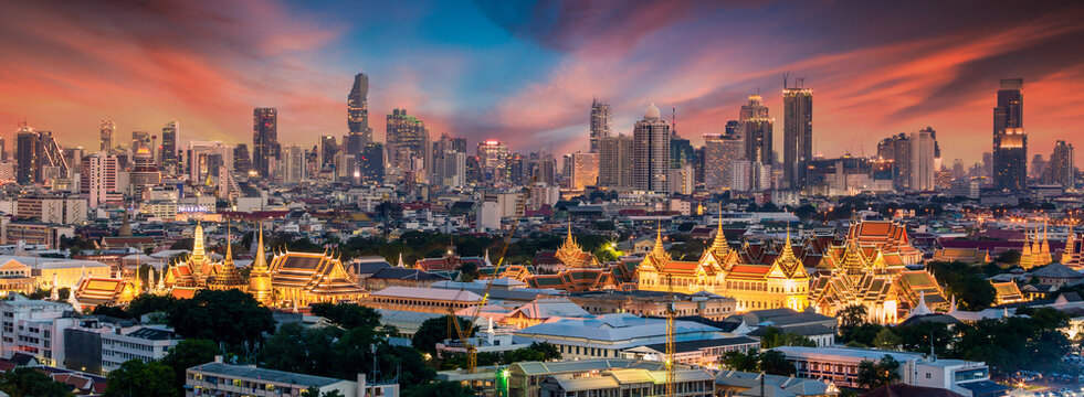 Aerial view Chao Phraya River Bangkok city urban downtown skyline of Thailand, Wat Arun Temple, Grand palace and Wat phra keaw, Business district with high building, Thailand - Powered by Adobe