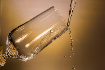 pouring water into glass