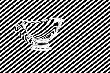 Empty glass jug against black and white stripes creating illusion of refraction of light