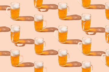 Glass of beer, mug pattern on pstel background