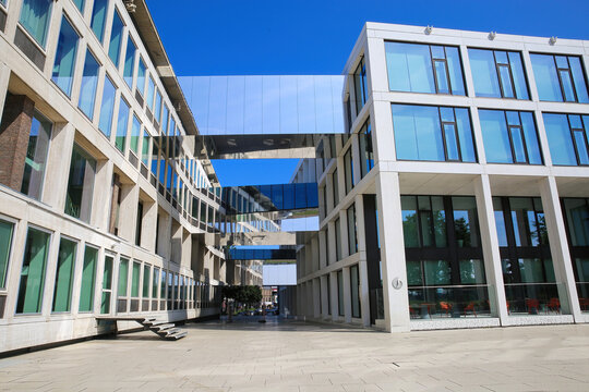 Arnhem (house of province), Netherlands - July 9. 2021: View on modern architecture office buildung with skybridges against blue summer sky