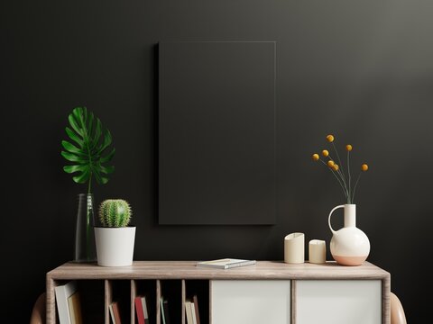 Mockup black poster on cabinet in living room interior on empty dark wall.