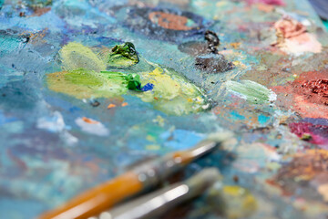 Obraz na płótnie Canvas Row of artist paint brushes closeup
