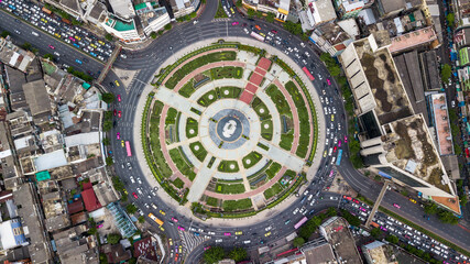 Aerial top view road roundabout with car lots in Bangkok City, Thailand, Circle Road traffic...