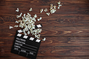 movie clapper board on wooden background