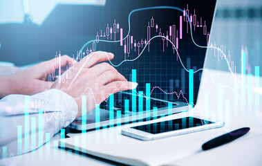 Various financial charts showing increase of price in stock market, digitalization and internet trading concept, close up of businessman hand typing laptop keyboard. Digital interface. Forex