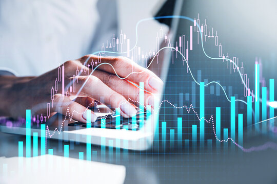 Various financial charts showing increase of price in stock market, digitalization and internet trading concept, close up of business woman hand typing laptop keyboard. Digital interface. Forex