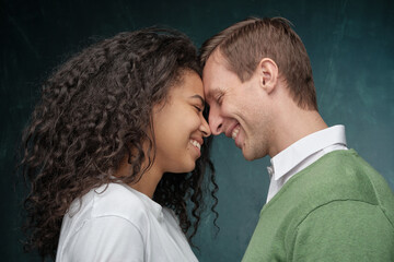 mixed race heterosexual couple loves hugging. Happy together romantic moments