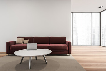 Minimalist white and red living room space