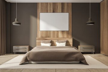 Dark bedroom interior with bed, empty poster and bedsides