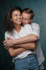 mixed race heterosexual couple loves hugging. Happy together romantic moments