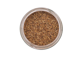 Cumin seeds in a round glass jar with a lid. Isolated on white background. Condiments and spices.