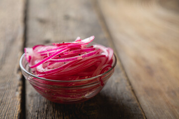 Red pickled onion, thinly sliced