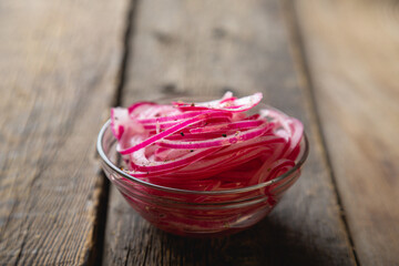 Red pickled onion, thinly sliced