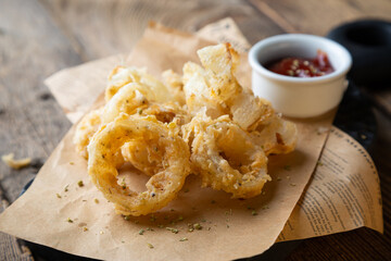 Fried crispy onion rings and sauce