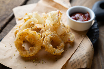Fried crispy onion rings and sauce