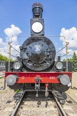 Rare black retro steam locomotive. Exposition area of RZD railway vehicles at Rizhskaya station Moscow, Russia