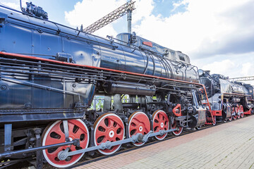 Rare black retro steam locomotive. Exposition area of RZD railway vehicles at Rizhskaya station Moscow, Russia