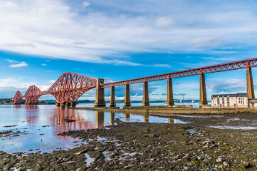 A view from Queensferry of the Forth Railway bridge over the Firth of Forth, Scotland on a summers...